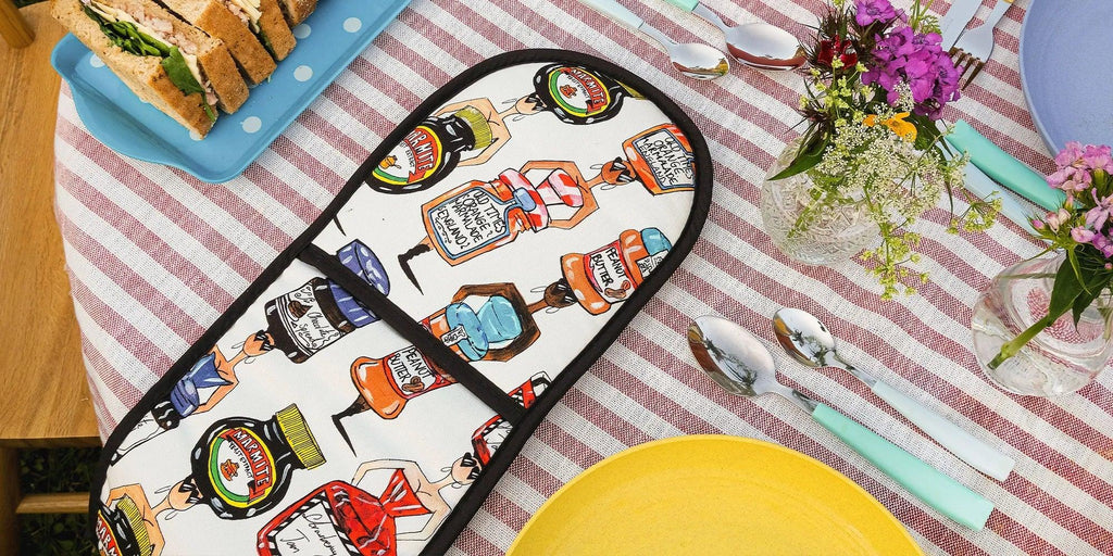 Charlotte Posner artistic oven gloves with colourful Pop Doll prints, luxury kitchen textiles
